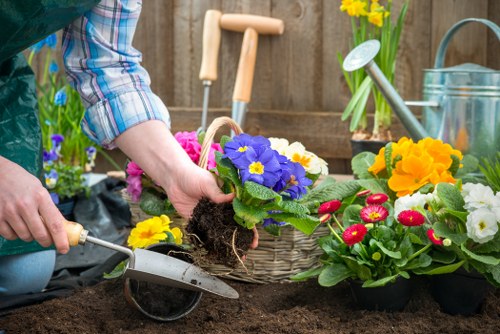 Pruning plants in Barbican garden