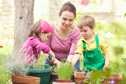 Professional gardener tending to plants